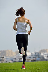 Image showing woman jogging at morning