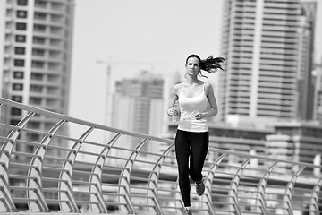 Image showing woman jogging at morning