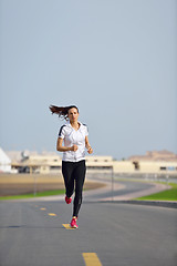 Image showing woman jogging at morning