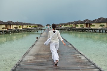 Image showing young woman relax on cloudy summer day