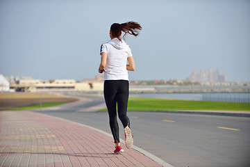 Image showing woman jogging at morning