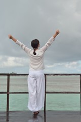 Image showing young woman relax on cloudy summer day