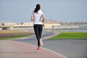 Image showing woman jogging at morning