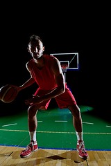 Image showing basketball player in action