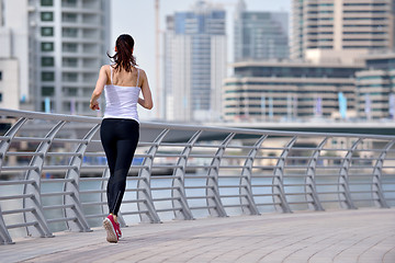 Image showing woman jogging at morning