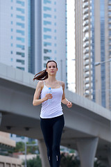 Image showing woman jogging at morning