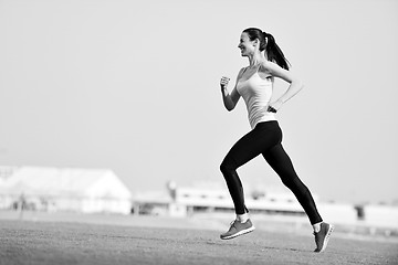 Image showing woman jogging at morning