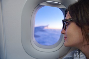 Image showing woman in airplane travel