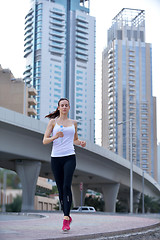 Image showing woman jogging at morning