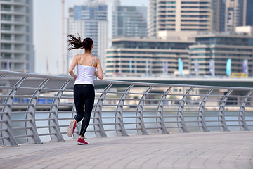 Image showing woman jogging at morning