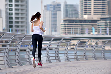 Image showing woman jogging at morning