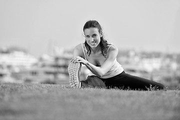 Image showing Young beautiful  woman jogging  on morning