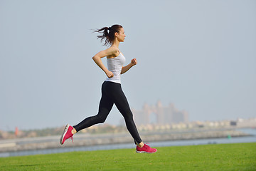 Image showing woman jogging at morning