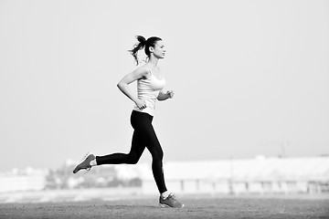 Image showing woman jogging at morning