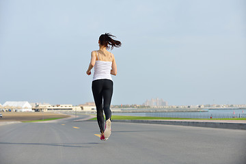 Image showing woman jogging at morning