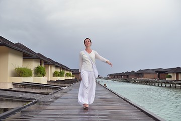 Image showing young woman relax on cloudy summer day