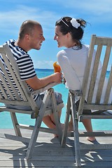 Image showing happy young couple relax and take fresh drink