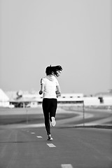 Image showing woman jogging at morning