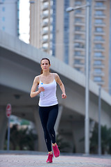 Image showing woman jogging at morning