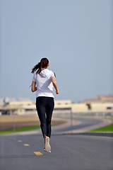 Image showing woman jogging at morning