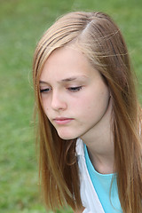 Image showing Thoughtful sad teenage girl