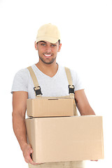 Image showing Handsome man delivering packages