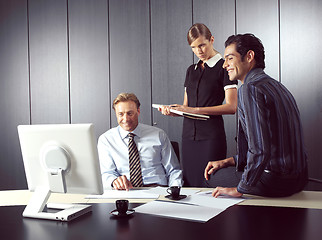 Image showing Business people working on computer 