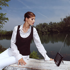 Image showing a woman with laptop in park