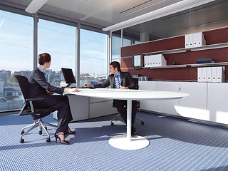 Image showing Business couple working at office a