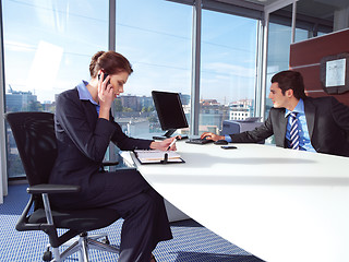 Image showing Woman calling on mobile phone b