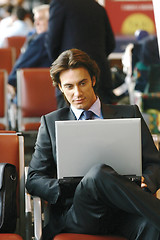 Image showing businessman sitting in the airport b