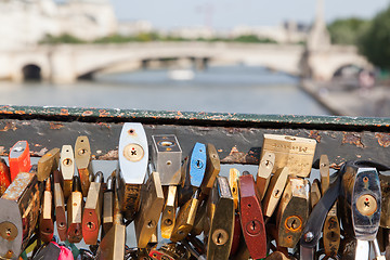 Image showing PARIS - JULY 27: Lockers at Pont des Arts symbolize love for eve