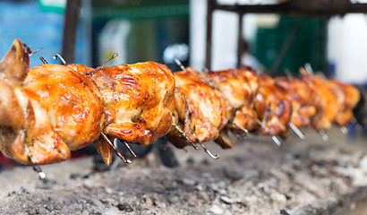 Image showing grilled chicken roasted on a spit