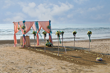 Image showing Flower decoration at the beach wedding venue