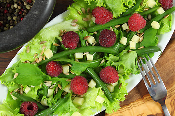 Image showing Salad with beans and raspberries