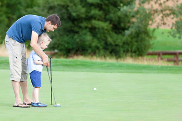 Image showing family golfing