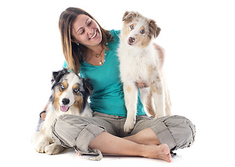 Image showing australian shepherds and woman