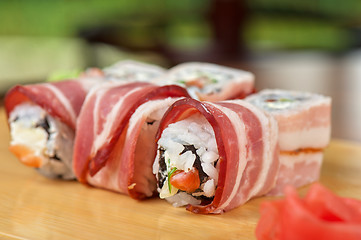 Image showing Sushi roll with bacon