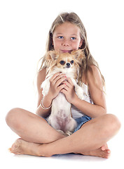 Image showing child and chihuahua