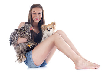 Image showing girl, chihuahua and chicken