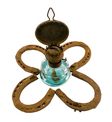 Image showing retro kerosene lamp  clover rusty horse shoe white 