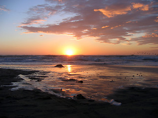 Image showing Sunset over the ocean