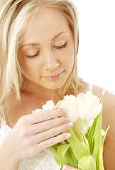 Image showing lovely blond with white tulips