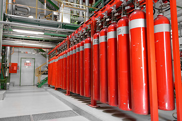 Image showing Large CO2 fire extinguishers in a power plant