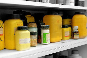 Image showing Photo of an old laboratory with a lot of bottles