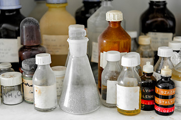 Image showing Photo of an old laboratory with a lot of bottles