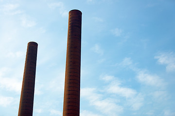 Image showing Tall industrial chimney