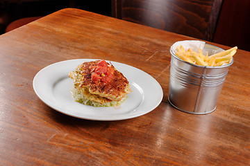 Image showing Fried chicken ribs and rice with tomato sauce