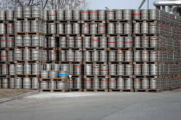 Image showing Lot of beer barrels stacked up