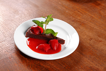 Image showing Chocolate cake wth strawberry and chili